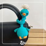 Blue-green knotted long-necked goose